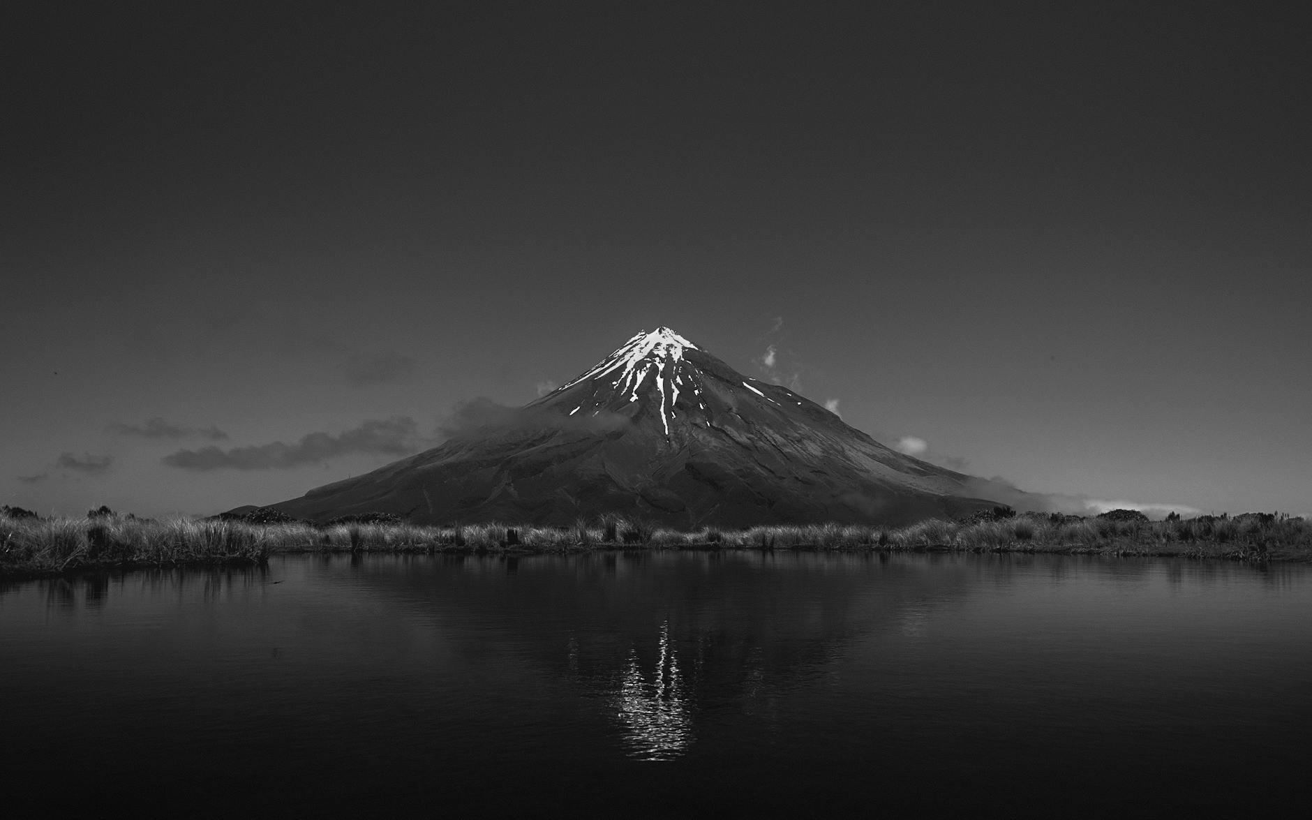 New Mirror — $25–$45 - Breathtaking black and white view of Mount Taranaki with a tranquil lake reflect