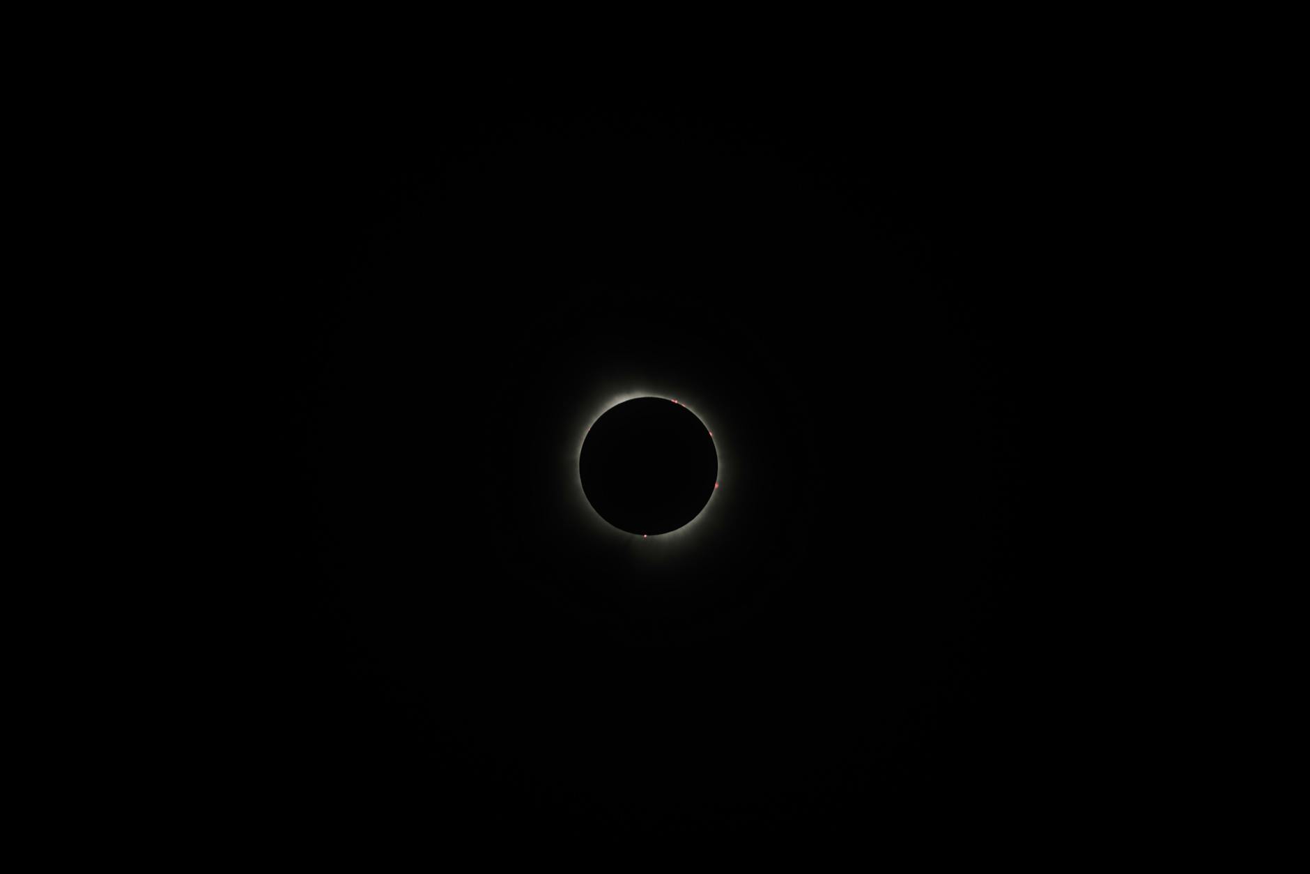 The System That Actually Works: $23 Total - A breathtaking view of a solar eclipse surrounded by darkness, showcasing the be