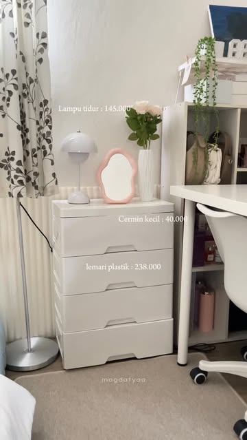 Soft sage green paint in small room making space feel bigger with calming green gray walls